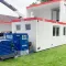 RECO hybride aggregaat met 60 kWh Battery Pack aangesloten op tijdelijke units.