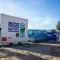 RECO 500 kWh batterijcontainer met aggregaat op een bouwplaats.