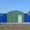 Varianthal van 10,9 meter breed met RECO-containers op een bouwplaats