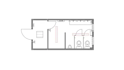 Plattegrond van sanitairunit met kleedruimte en twee toiletten.
